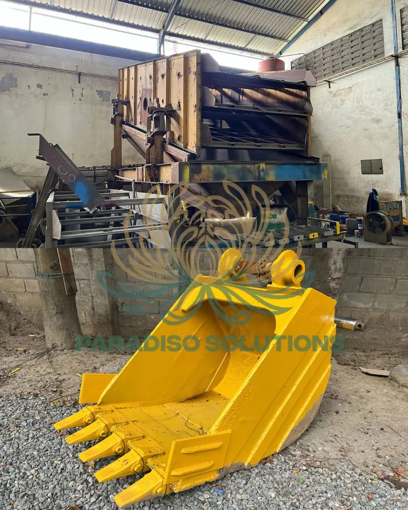 Excavator and heavy equipment in an outdoor work area